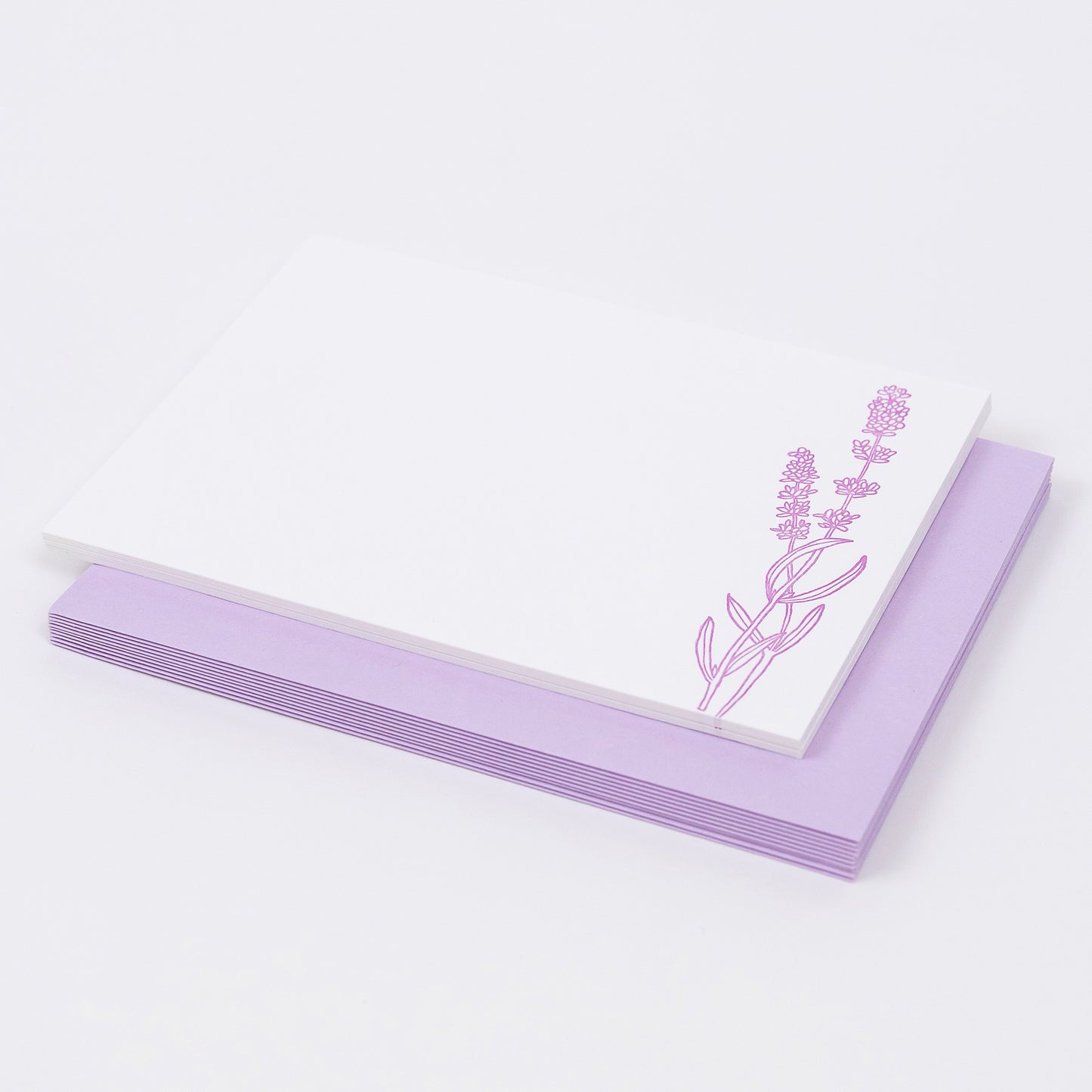 Set of 10 Letterpress Note Cards featuring a hand-drawn lavender sprigs, letterpress printed in a vibrant lavender ink onto 100% cotton paper. Includes 10 soft lavender envelopes. Size A6.