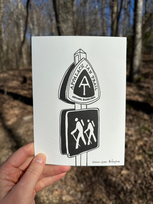 This letterpress print features a hand-drawn image of a sign from the Appalachain Trail. The print was inspired by my 2012 Northbound Thru-Hike of the entire Appalachian Trail.   The text and imagery are hand-drawn. This print has a tactile texture from the letterpress impression on cotton paper.  It is suitable for framing and makes great wall art. Fits any standard 5"x7" frame. The print is shown outside in front of a forest in winter. 