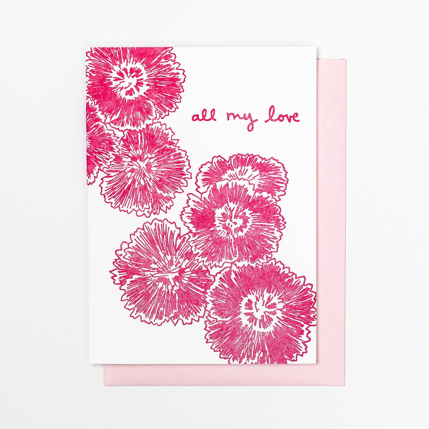 Letterpress greeting card featuring hand-drawn dianthus flowers, printed in a vibrant deep pink ink. The top right corner of the card says "all my love" in a whimsical hand-drawn text, in the same pink ink. The card is white, blank inside, and is paired with a light pink envelope.