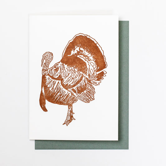 Letterpress greeting card featuring hand-drawn Appalachian Wild Tom Turkey, printed in an earthy brown ink. There is no text on the card. The white card is 100% cotton, blank inside, and is paired with a slate gray envelope.