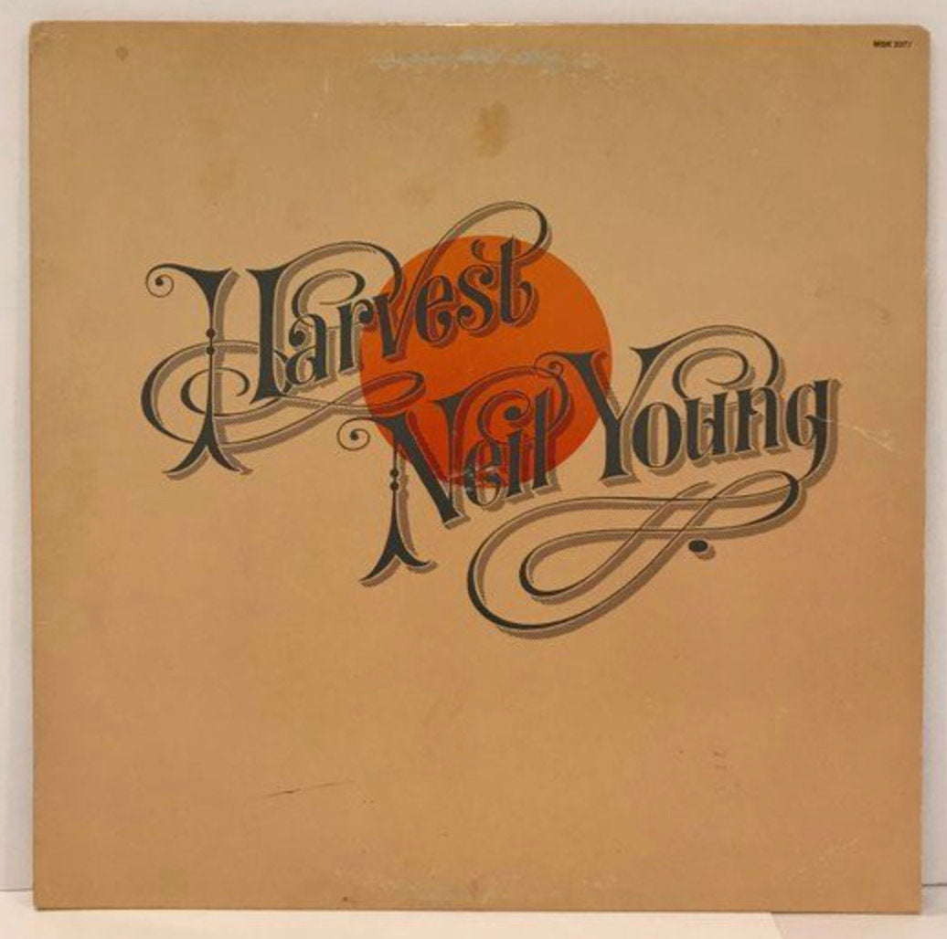 The original Neil Young's Harvest album artwork that inspired the new illustration and sticker by Macon York.